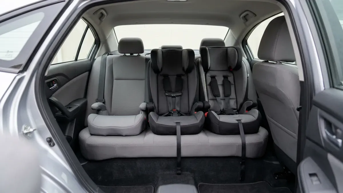 Don’t Pick the Narrowest Booster Seat Until You Check the Row Math